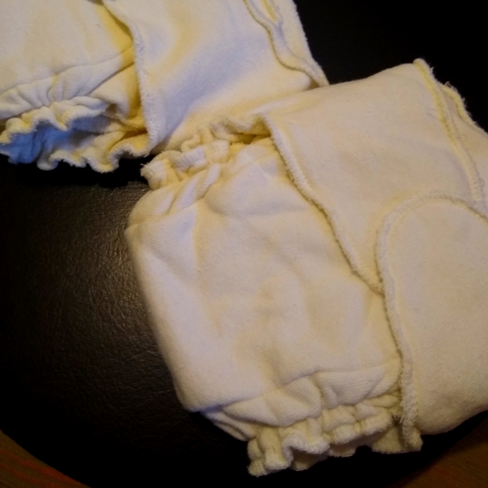 Two contour diapers